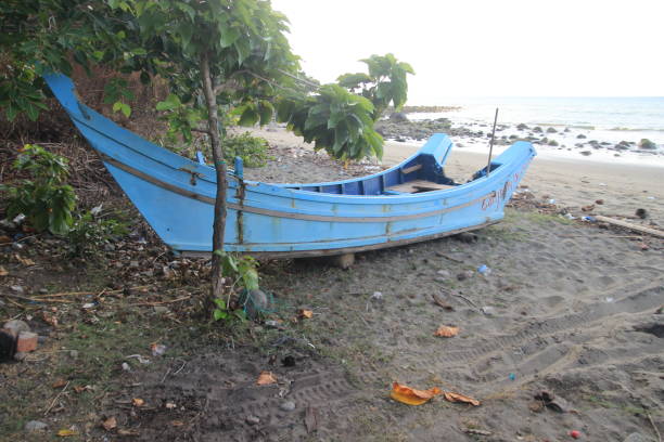 istock Old fisherman boat at the beach 1924791858