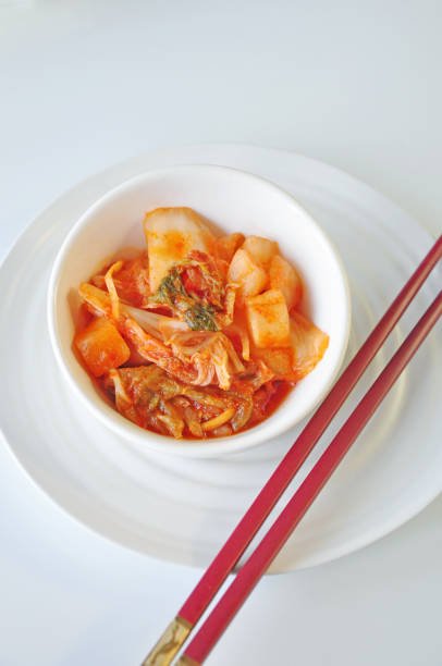 istock Top view of Cabbage Kimchi Bowl on White Background 1924823357