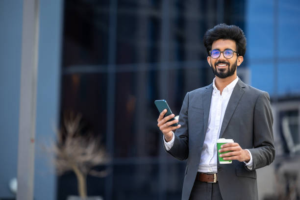 istock Elegant hindu young man with a phone in hands 1924834417