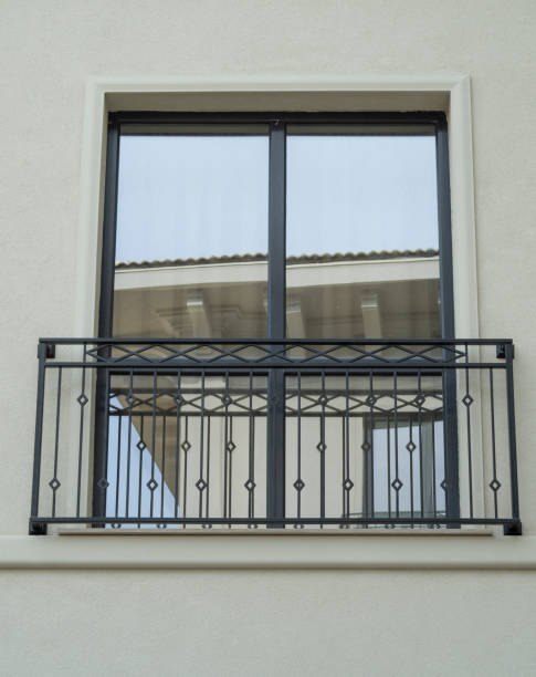istock New window  with black wrought iron window railings closeup 1924848184