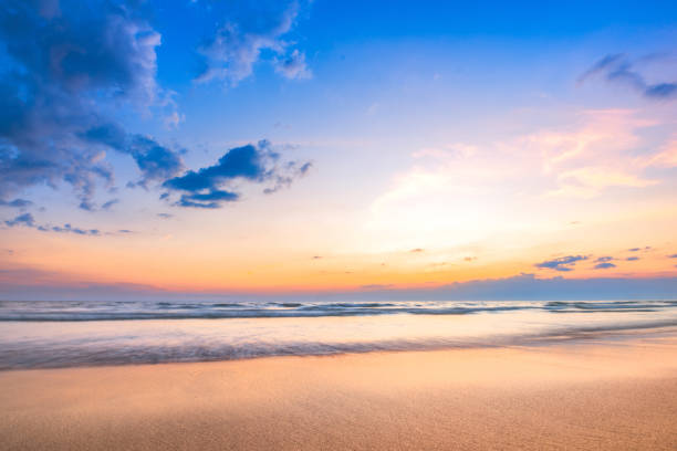 istock Calm seascape with a beautiful sunset sky and fluffy clouds. 1924851358