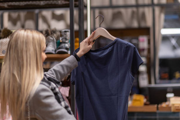 istock Woman in shopping for clothes 1924853622