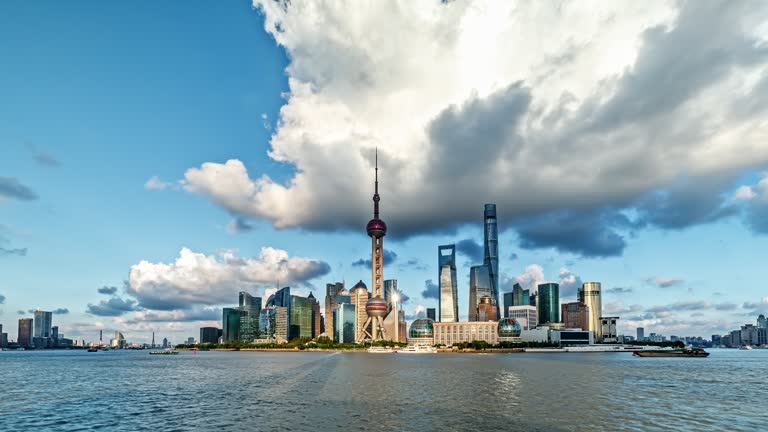 Shanghai skyline and modern commercial buildings scenery at sunset