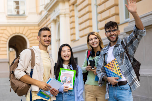 istock Multicultural group of college students or friends standing in campus. 1924871225