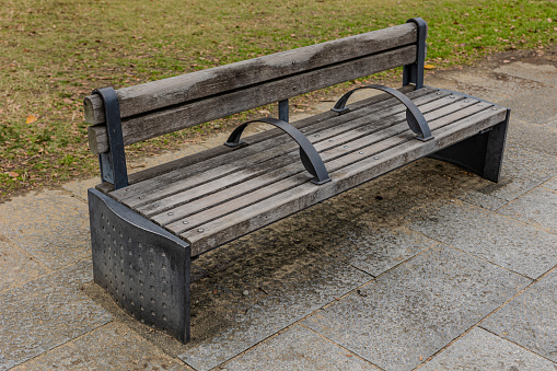 Bench on cement wall outside