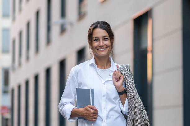 istock Pretty smiling woman looking confident and determined 1924901569