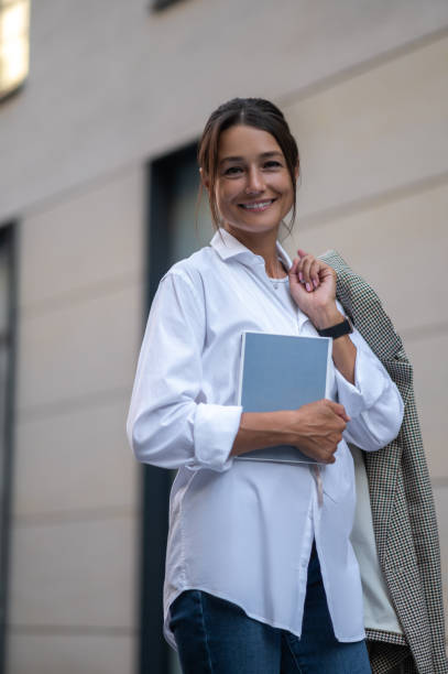 istock Pretty smiling woman looking confident and determined 1924901574