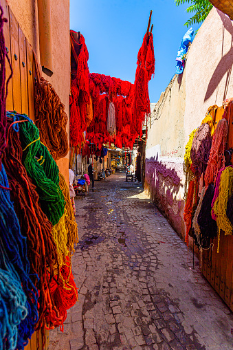 Marrakech,Morocco 19 May 2023:Wool hanging for drying in the souk of dye craftsmen in the Medina of Marrakech
