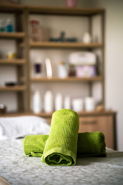 Green towels in beauty salon. No people