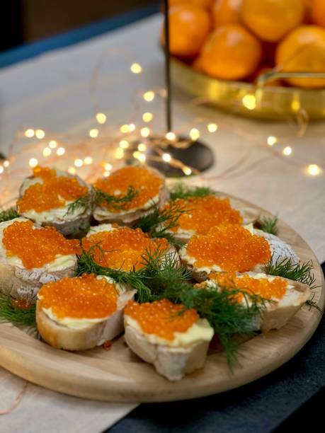 istock Festive candlelight dinner with shrimp and caviar sandwiches 1924910764