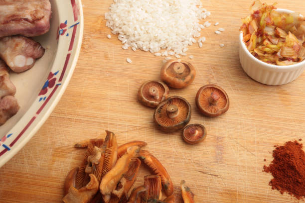istock ingredients for spanish autumn rice with mushrooms 1924912409