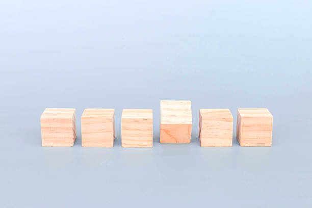 istock Wooden geometric shapes cube for conceptual design. Education game. isolated on gray background. 1924924278