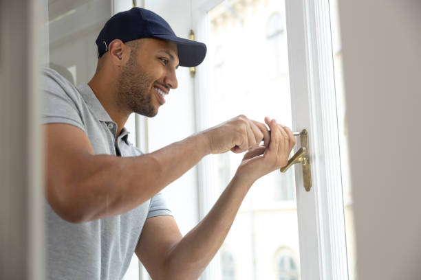 istock Professional handyman fixing window handle at home. 1924941559