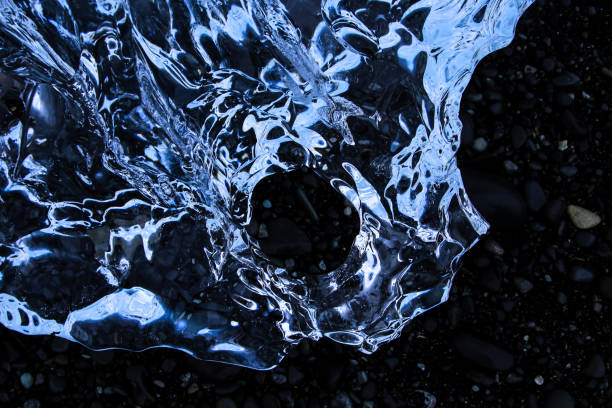 blue ice rocks at Diamond Beach in Iceland