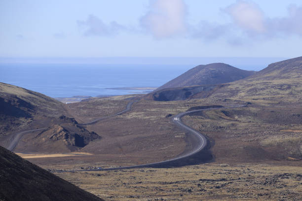 istock curved road in Iceland 1924958053