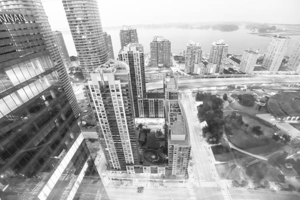 Tall apartment buildings,  modern architecture, urban skyline. Black and white view of downtown district, Toronto, Canada.