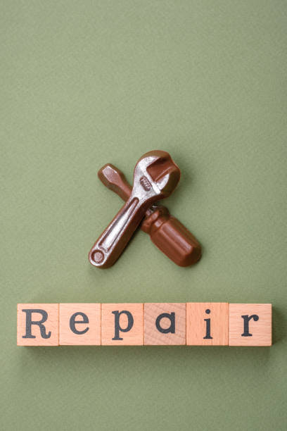 istock Tools and inscriptions symbolizing repairs or a garage and its attributes on a plain background 1924980066
