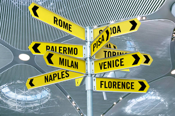 Travel locations in Italy Directional signs with travel locations in Italy in an airport terminal florence italy airport stock pictures, royalty-free photos & images