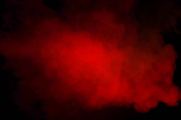 Orange and red steam on a black background. Copy space.