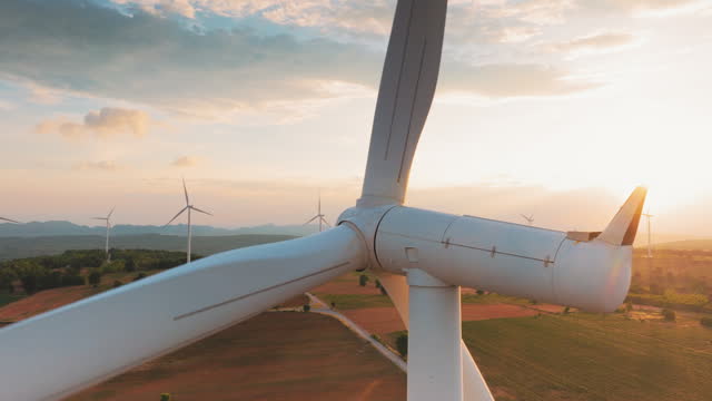 Aerial view wind turbines at Sunset