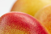 Yellow and red pears with spots, macro.