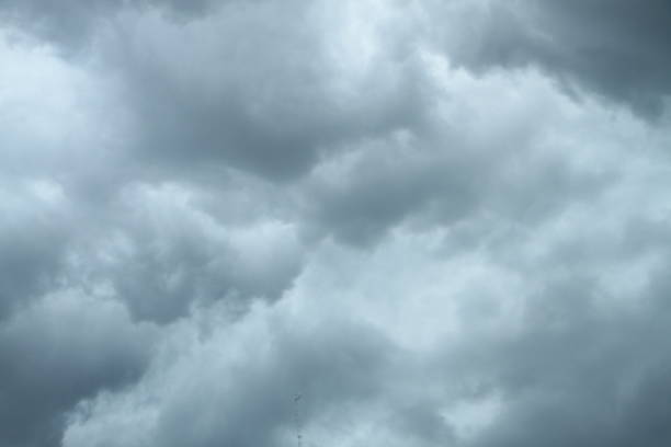 Dramatic, dark, blue cloudy sky overlay, Sky-overlays. Dramatic sky and lightning. Bad weather with dark clouds. Rain And Thunderstorm In Dramatic Sky