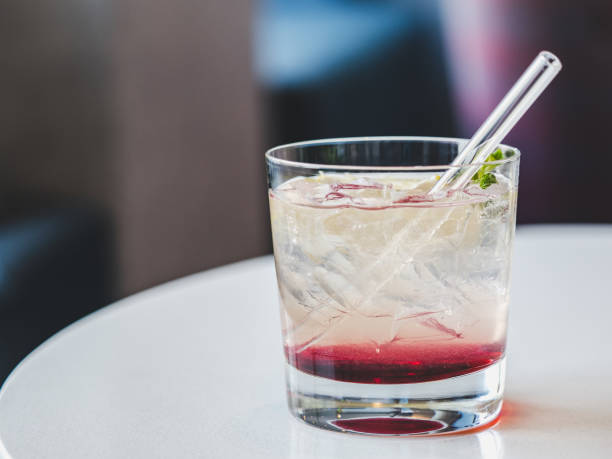 istock Beautiful glass with a refresh cocktail, standing on a table 1925090908
