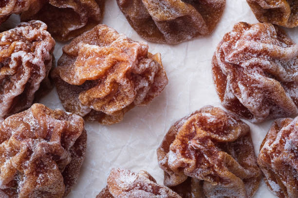 istock Dried persimmons on a white crumpled paper. 1925091164