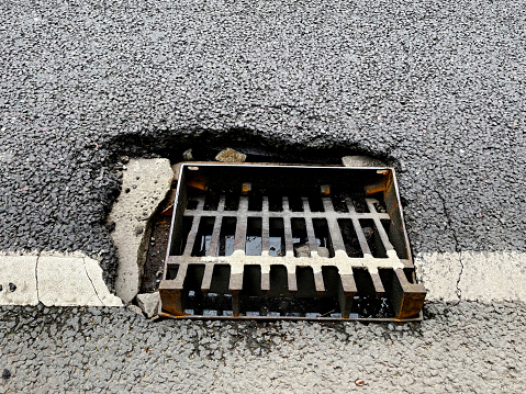 Dangerous broken drain cover on a busy road in Essex