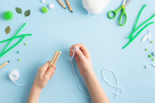 istock Step by step diy process of making snowdrops flowers. Creativity, crafting with kids. 1925115248