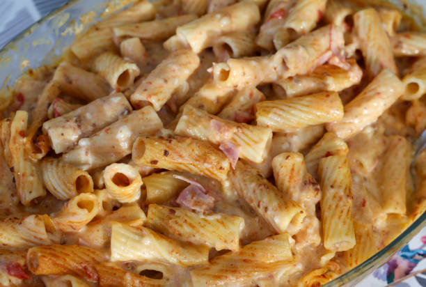 baked pasta with ham in bechamel sauce