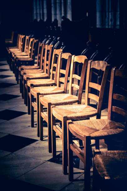 Row Of Empty Pews In Church