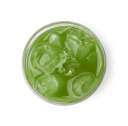 Glass of delicious iced green matcha tea isolated on white, top view