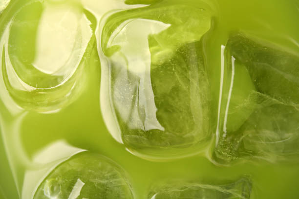 istock Delicious iced green matcha tea as background, closeup 1925157636