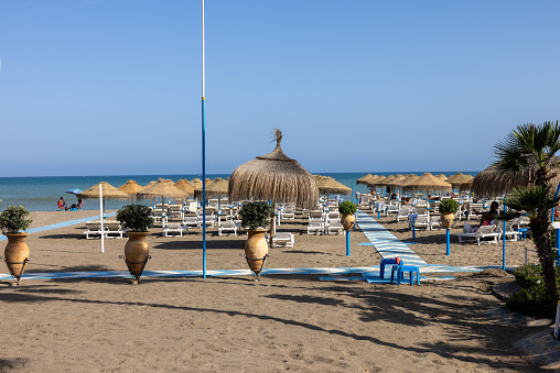 Torremolinos, Spain - September 9, 2023:  La Carihuela beach in Torremolinos, Malaga, Costa del Sol, Spain