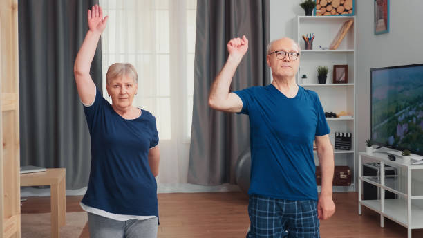 istock Happy senior couple exercising 1925219319