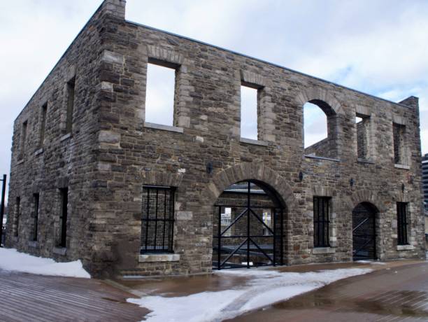 A skeleton exterior of a turn of the century stone building.