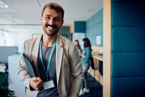 istock Happy businessman working in the office and looking at camera. 1925295423