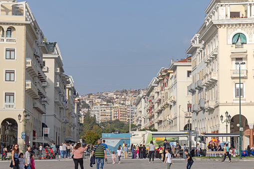 Thessaloniki, Greece - October 22, 2023: People Walking at Aristotelous Square Sunny Autumn Day Cityscape.