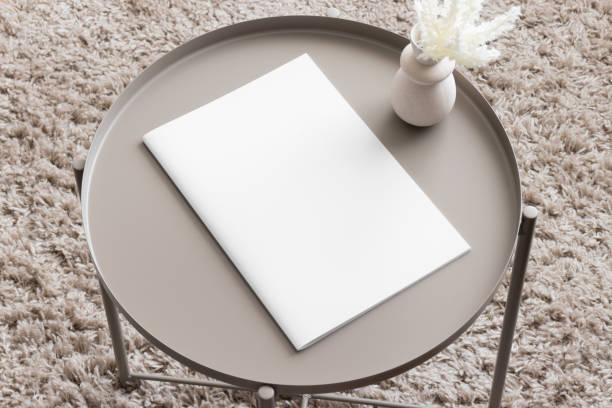 istock Magazine mockup with a pampas on the beige table. 1925372323
