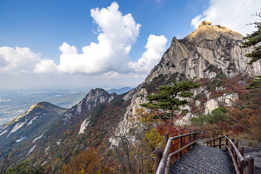 stairs and hiking path to baegundae mountain peak in bukhansan national park, seoul prefecture, south korea.