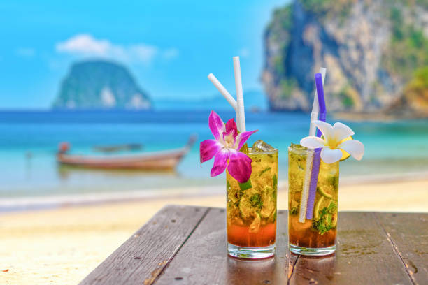 Two cocktails in a beach bar in Thailand Two cocktails in a beach bar in Thailand phuket beach party stock pictures, royalty-free photos & images