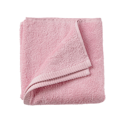 Pink terry towel isolated on white background