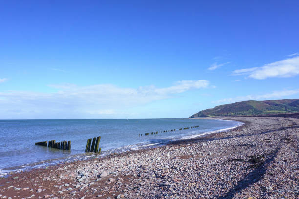 istock stoney beach at Porlock Weir in Somerset, UK 1925388897