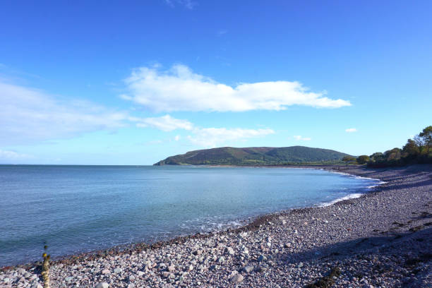 istock stoney beach at Porlock Weir in Somerset, UK 1925390492