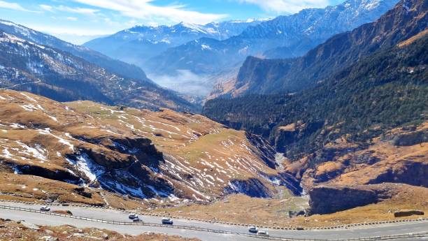 istock Mountain road and valley top view 1925436153