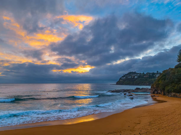istock Northern Beaches Sunrise at the seaside with rain clouds 1925486270