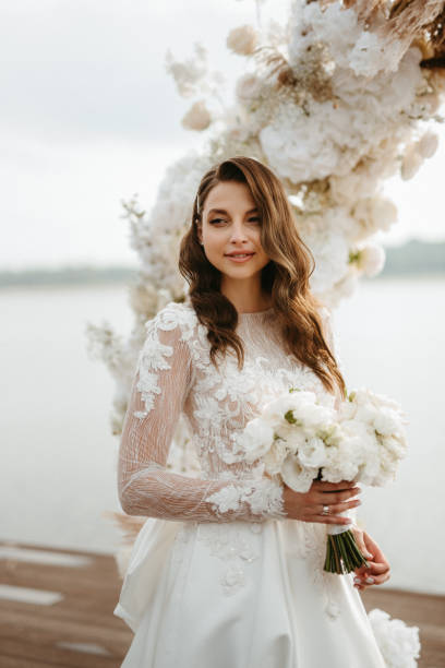istock bride against the background of a yellow sunset 1925517215