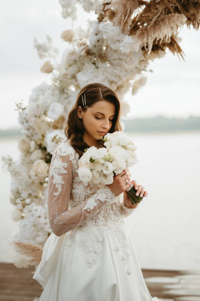 istock bride against the background of a yellow sunset 1925525728