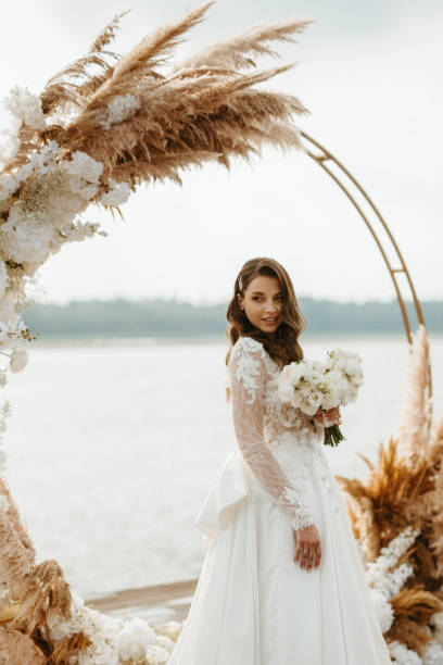 istock bride against the background of a yellow sunset 1925526827